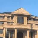 鄂尔多斯黄金麻别墅外墙干挂石材效果示例