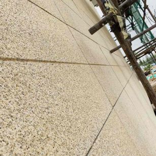 鄂尔多斯 黄金麻花岗岩荔枝面外墙干挂石材效果示例