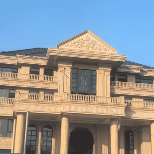 鄂尔多斯黄金麻别墅外墙干挂石材效果示例