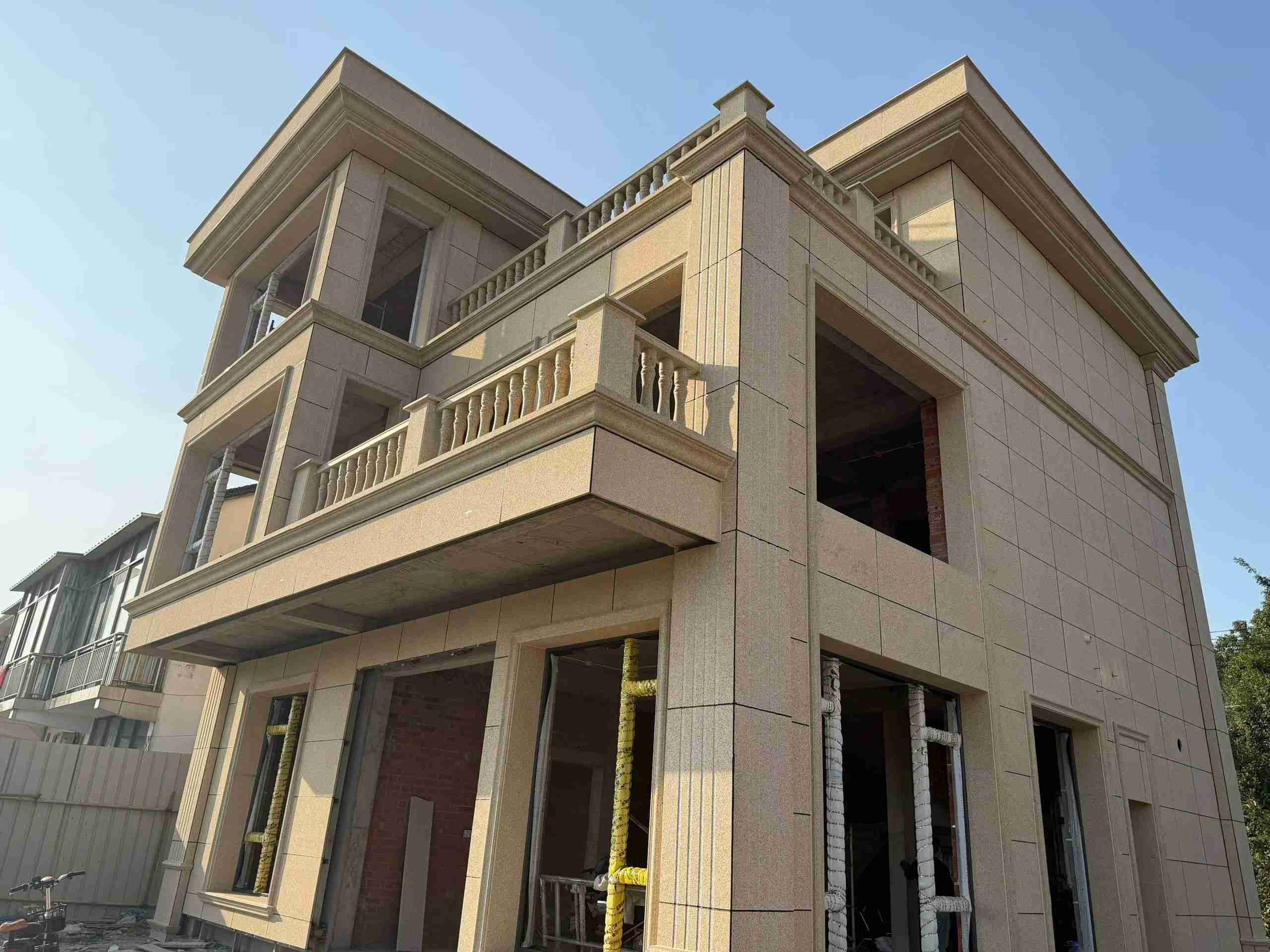 鄂尔多斯 黄金麻花岗岩石材荔枝面外墙干挂效果展示