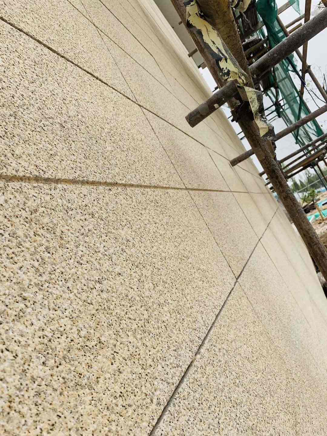 鄂尔多斯 黄金麻花岗岩荔枝面外墙干挂石材效果示例